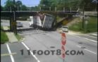 Two Men, a Truck  and a Bridge